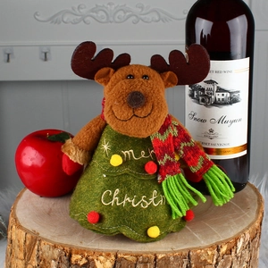 Christmas reindeer plush figure in green dress with Merry Christmas embroidery
