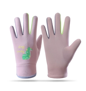 Close-up of pink children's ski glove with cartoon dinosaur and Sport Boy text