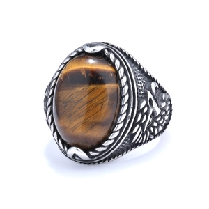 Vintage men's stainless steel eagle ring featuring a large oval tiger eye stone inlay