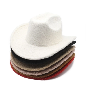Macro shot of fluffy teddy fleece texture on multi-colored western cowboy party hats