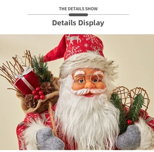 Detail of Santa Claus figurine with white beard, glasses, and gift bag with pine cones