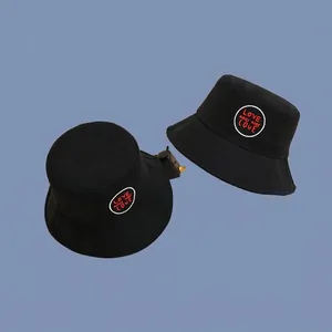 Classic black cotton bucket hat with Love Makes More Love embroidery for casual sun protection