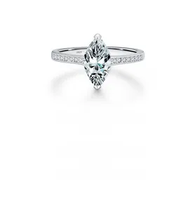 Macro shot of S925 hallmark on a silver marquise-cut diamond ring band detail