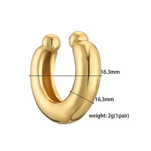 Detail view of gold C-shaped ear cuff with dimensions 16.3mm and spherical ends