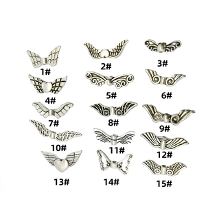 Collection of 15 styles of vintage silver angel wing charms and DIY alloy jewelry beads