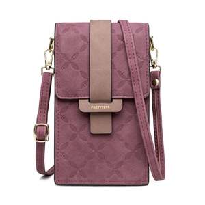 Detail of purple mini crossbody phone bag with embossed floral pattern and gold buckle