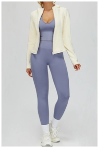 Three-piece women's sports set with hooded fleece jacket, lilac sports bra and leggings