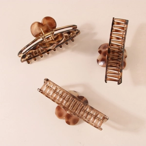 Large vintage leopard print heart hair claw clips for thick hair shown in multiple angles