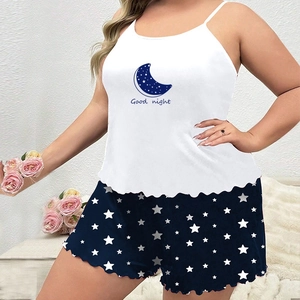 Women's two-piece star and moon pajama set with white camisole and blue shorts