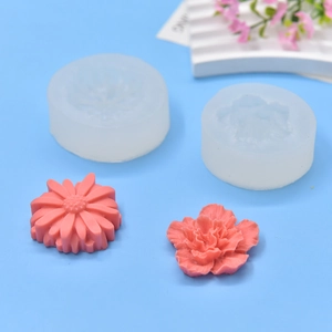Daisy and carnation flower silicone molds with pink soap flower finished products