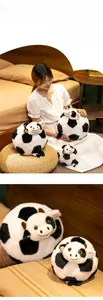 Close-up of football-shaped plush cow toy showing various sizes and high-elastic filling