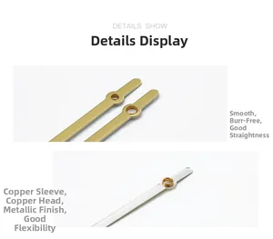 Macro detail of metal quartz clock hands with copper sleeve and smooth finish