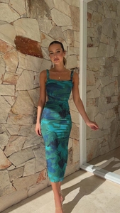 Detailed view of the sleeveless floral dress showing pleated texture and slim fit design