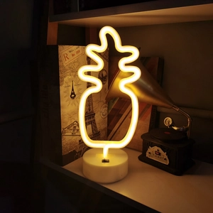 LED pineapple neon sign with white base glowing warm yellow for bedroom table decor