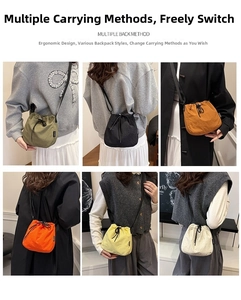 Showcasing six different colors of the drawstring bucket bag with adjustable shoulder straps