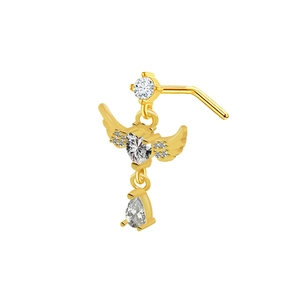Close-up of golden nose stud with heart angel wings and crystal teardrop pendant