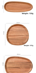 Three sizes of acacia wood serving trays showcasing natural grain and smooth edges