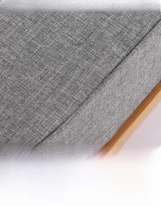 Detailed close-up of double-stitched seams on durable gray oxford fabric organizer box