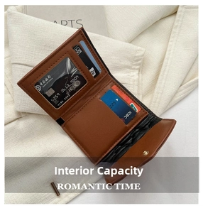 Detail view of brown leather wallet interior featuring card slots and ID window