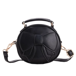 Chic black round PU leather crossbody bag with decorative bow and golden hardware