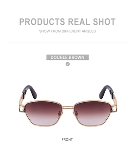 Detail of Double Brown gradient lenses and golden C-shape hollow metal temples