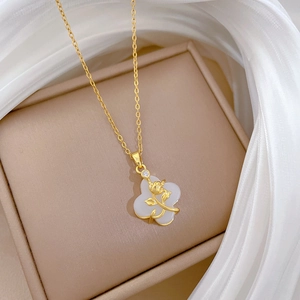 Close-up of titanium steel clover necklace with rose center and micro-inlaid zircon