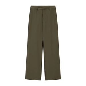Detail of olive green wide-leg trousers with side pockets and elastic waist design