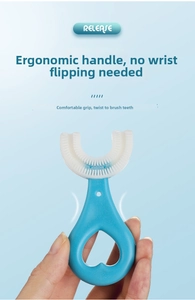Close-up of sky blue heart-shaped ergonomic handle and U-shaped silicone toothbrush
