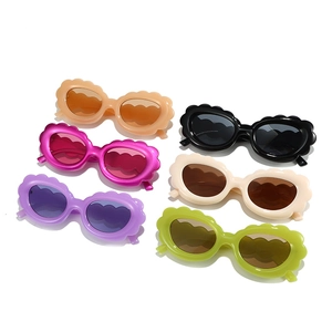 Fashionable wave-shaped sunglasses in six assorted colors including white, green, and purple
