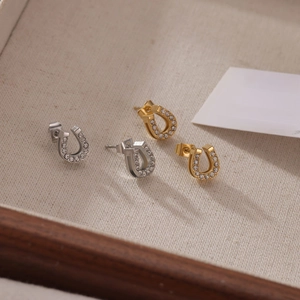 Elegant U-shaped horseshoe stud earrings with crystals in gold and silver finish