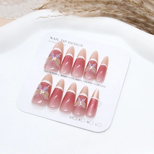Pink gradient long stiletto press-on nails with butterfly motifs and white tips