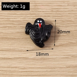 Detail view of a 18x20mm black resin ghost charm for DIY crafts and jewelry making