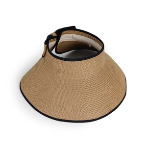 Detailed close-up of straw sun hat showing high-quality weave texture and black fabric trim