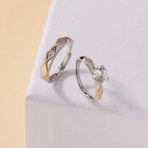 Macro shot of S925 silver adjustable couple rings with geometric contrast and S925 stamp
