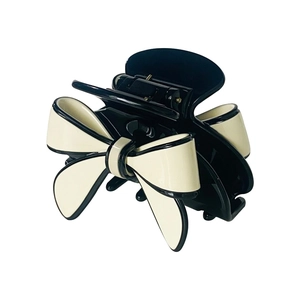 French style acetate claw clip with cream bow and black trim for hair styling