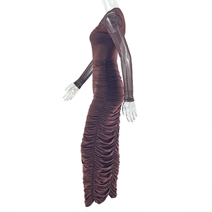 Detail view of coffee brown bodycon dress with ruching and sheer mesh long sleeves