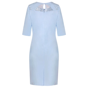 Detail of the light blue dress featuring floral lace patchwork and an invisible back zipper