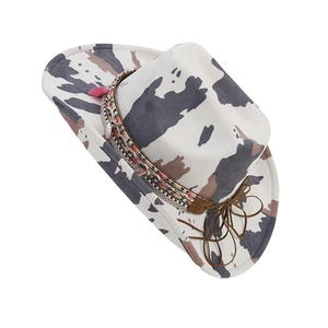 Western style cow print felt hat with colorful braided band and pink tassel detail