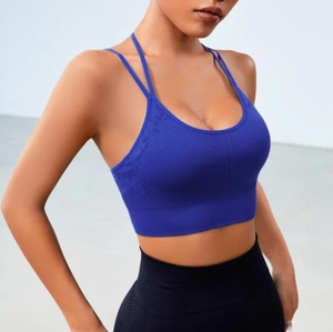 Soutien-gorge de sport bleu foncé à bretelles croisées et pantalon de yoga noir