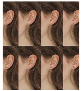 Detailed macro view showing eight styles of S925 silver gold-plated zircon stud earrings