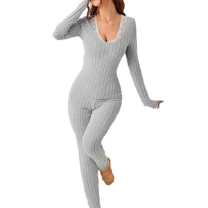 Women's grey ribbed knit pajama set with V-neck long sleeve top and lace trim details