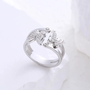 Bague papillon ajustable en argent avec cristaux scintillants sur double anneau métal