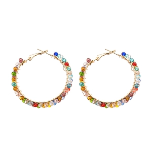 Luxurious geometric gold hoop earrings with vibrant colorful faceted glass beads