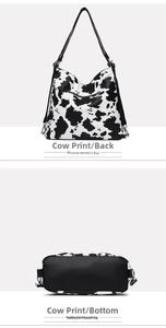 Detail view of the back and base of the cow print PU leather crossbody bag with zipper