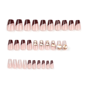 French red and champagne press-on nails with glitter lines and 3D rhinestones