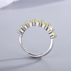 Silver S925 open ring featuring square yellow zircon stones in a stylish row setting