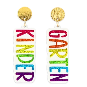Detail showing white earrings with colorful glitter text reading KINDER GARTEN