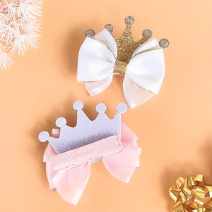 Glitter princess crown hair clips with satin bow and safe fully wrapped base for girls