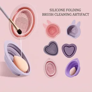Collapsible silicone makeup brush cleaning bowl with textured bottom and cute shapes