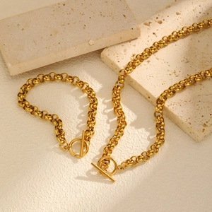 Golden stainless steel rolo chain necklace and bracelet set with toggle clasp on stone